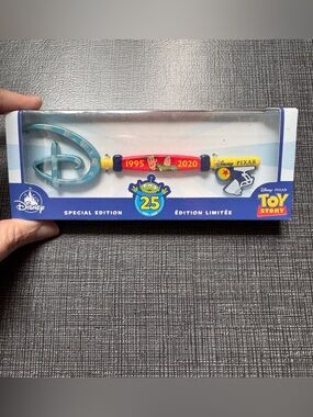 Disney Toy Story 25th Anniversary Collectible Key - Red, Yellow, Teal, Blue